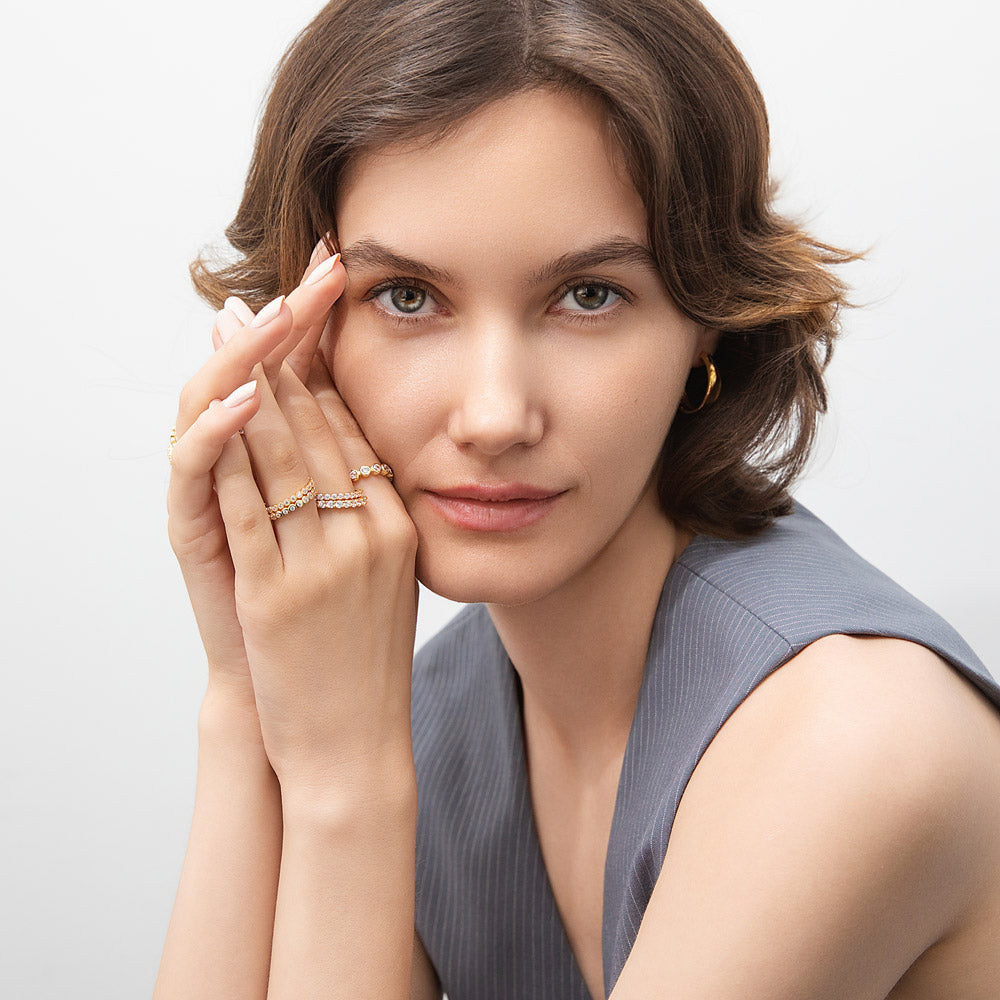 Model wearing Pave CZ Eternity Ring in Gold Flashed Sterling Silver, 3 of 8