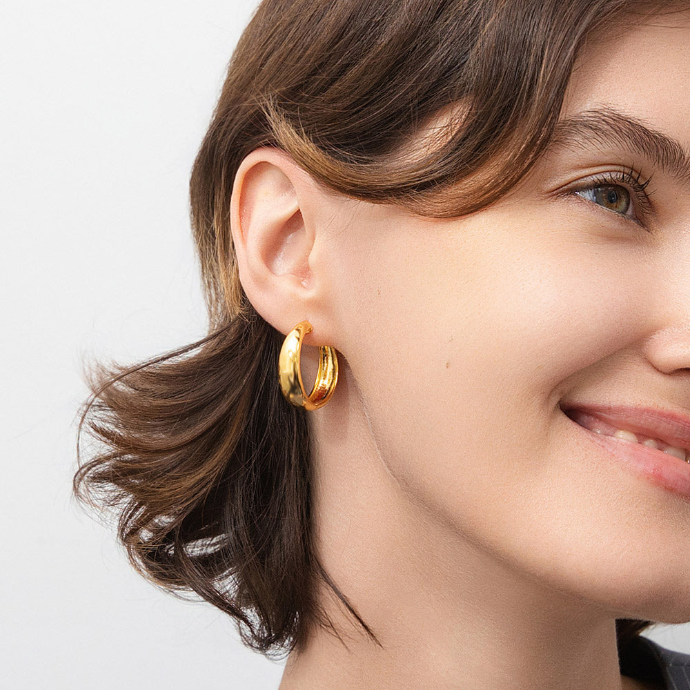 Model wearing Dome Hoop Earrings in Gold Flashed Sterling Silver, 2 Pairs, 2 of 19