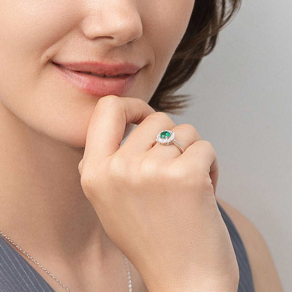 Model wearing Halo Flower Green CZ Ring in Sterling Silver, 3 of 10