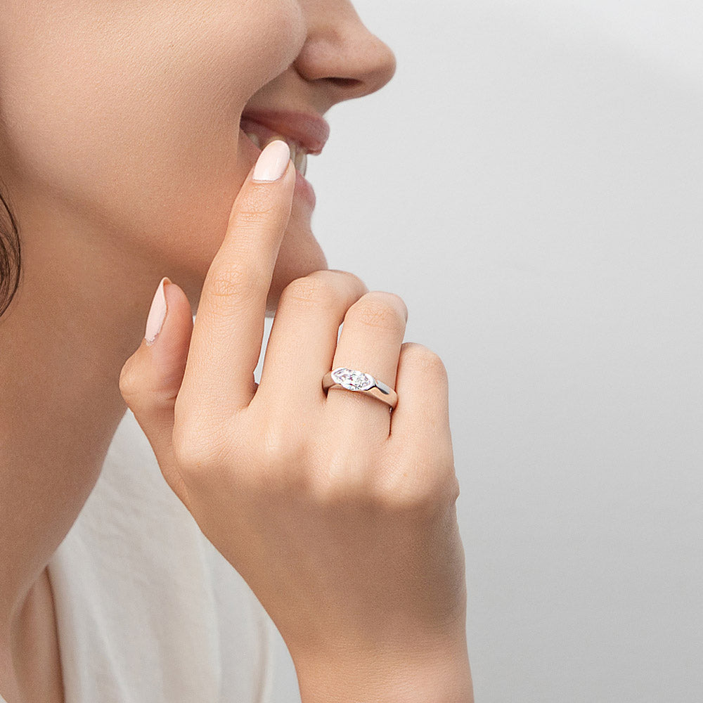 Model wearing East-West Solitaire 1ct Bezel CZ Ring in Sterling Silver, 2 of 11