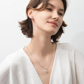 Model wearing North Star CZ Necklace and Earrings in Sterling Silver, Yellow Gold Flashed