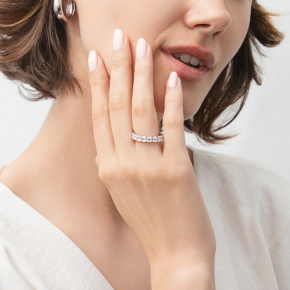 Model wearing Asscher CZ Eternity Ring in Sterling Silver, 2 of 7