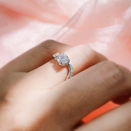 Model Wearing Solitaire with Side Stones Ring