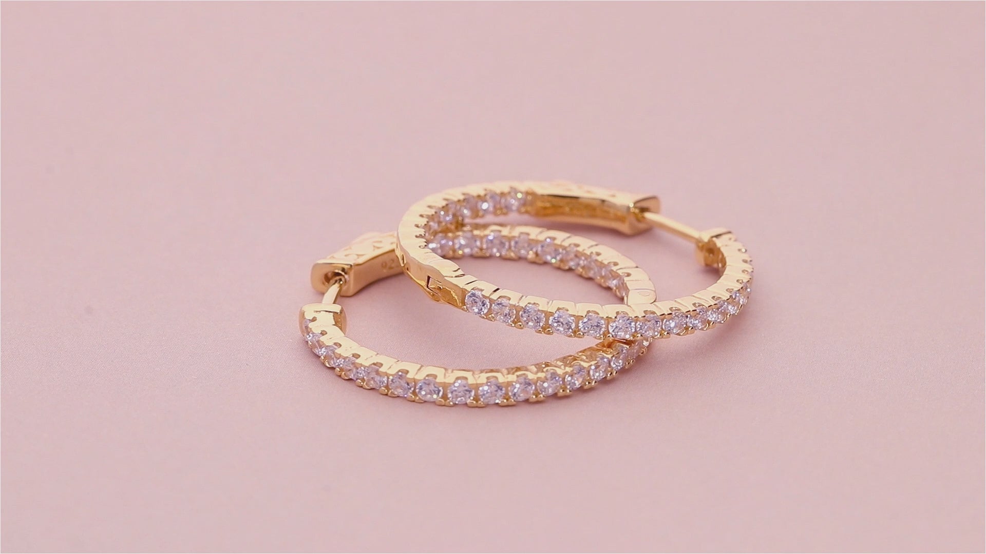 Video Contains CZ Medium Inside-Out Hoop Earrings in Sterling Silver 1". Style Number E948-VP