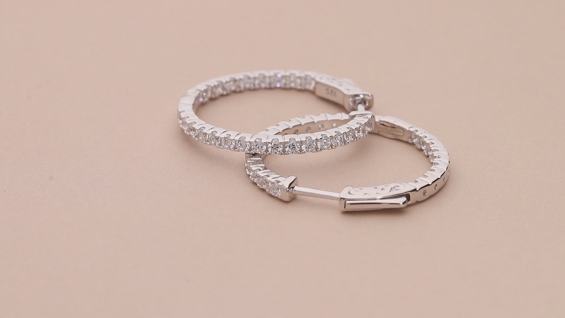 Video Contains CZ Inside-Out Hoop Earrings in Sterling Silver, 2 Pairs. Style Number VS816-01