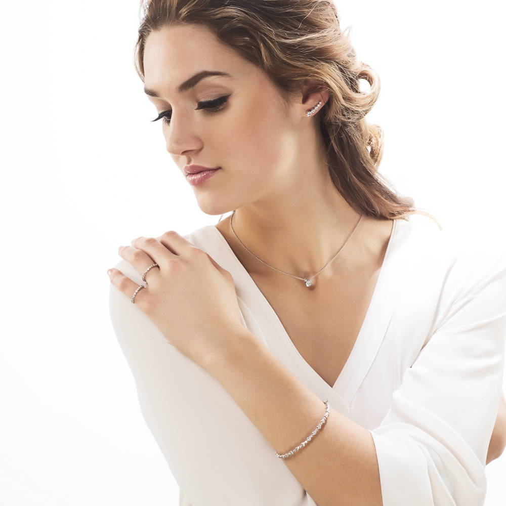 Model wearing Solitaire 0.9ct Bezel Set Round CZ Necklace in Sterling Silver, 2 Piece, 7 of 11