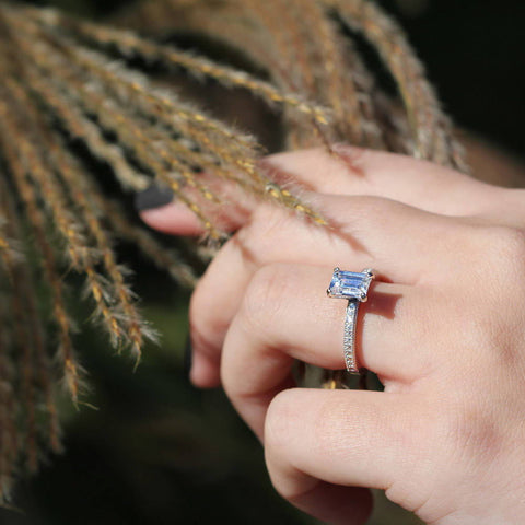 Image Contain: Model Wearing Solitaire with Side Stones Ring