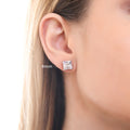 Model wearing Solitaire Princess CZ Stud Earrings in Sterling Silver, 4mm