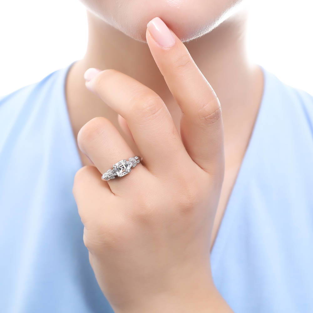 Model wearing Solitaire 2ct Asscher CZ Ring in Sterling Silver, 2 of 7