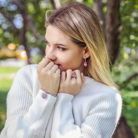 Image Contain: Model Wearing 3-Stone Ring, Heart Charm Bracelet, Solitaire with Side Stones Dangle Earrings