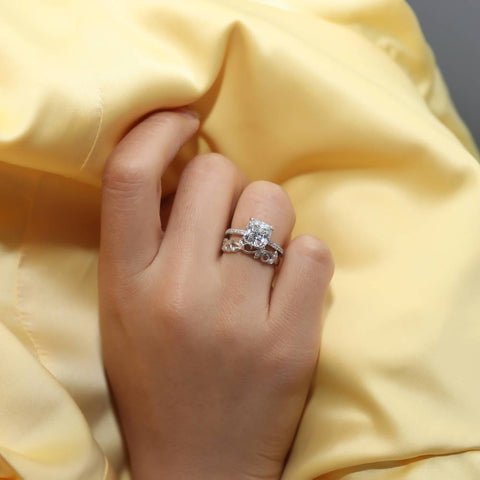 Image Contain: Model Wearing Leaf Ring, Solitaire with Side Stones Ring