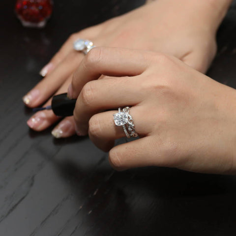 Image Contain: Model Wearing Leaf Ring, Solitaire with Side Stones Ring