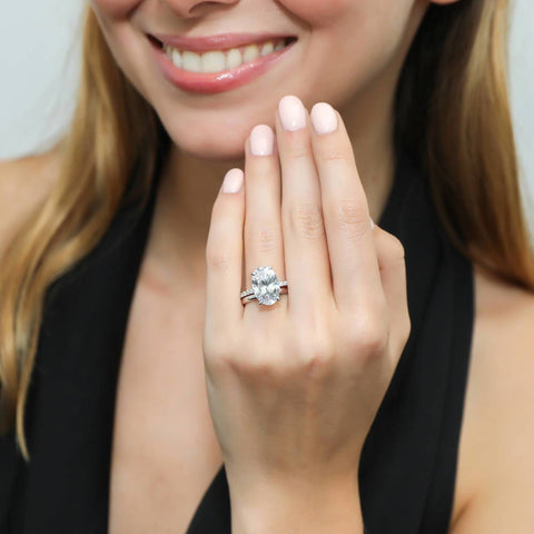 Image Contain: Model Wearing Band, Solitaire with Side Stones Ring