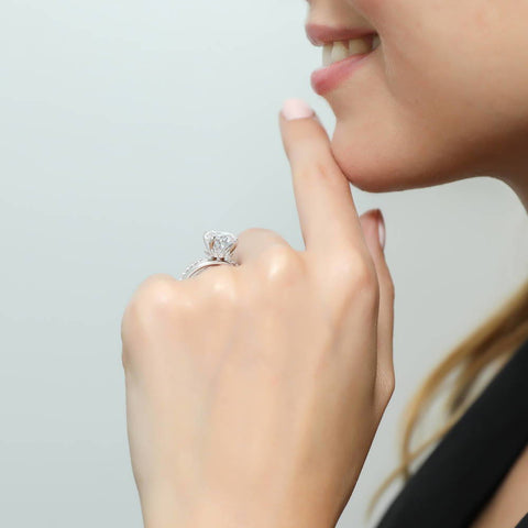 Image Contain: Model Wearing Band, Solitaire with Side Stones Ring