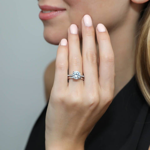 Image Contain: Model Wearing Band, Solitaire with Side Stones Ring