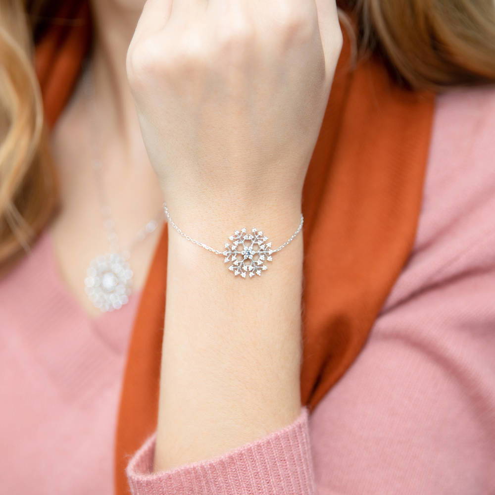 Model wearing Snowflake CZ Rolo Chain Bracelet in Sterling Silver, 2 of 4