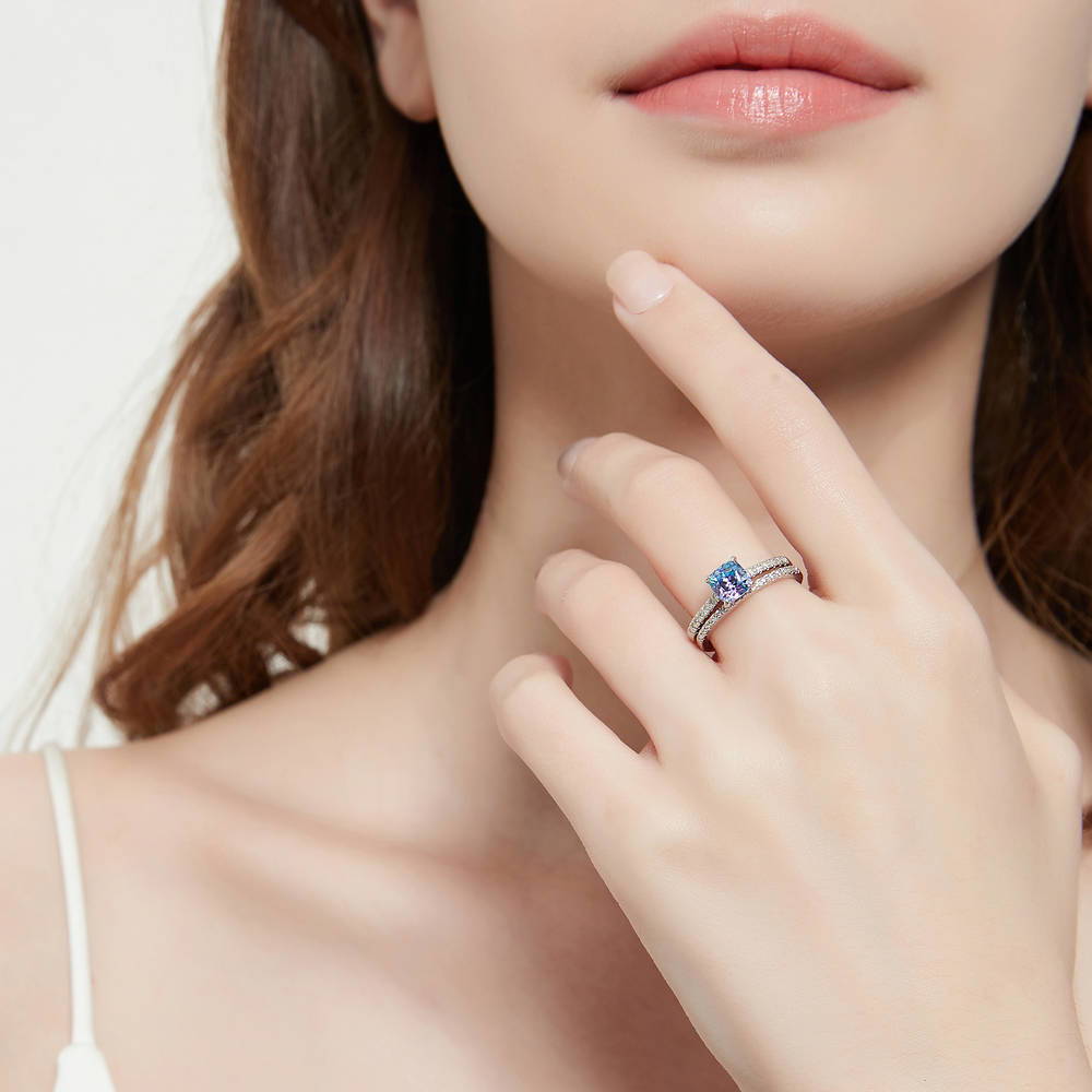 Model wearing Solitaire 1.25ct Purple Aqua Cushion CZ Ring Set in Sterling Silver, 2 of 14
