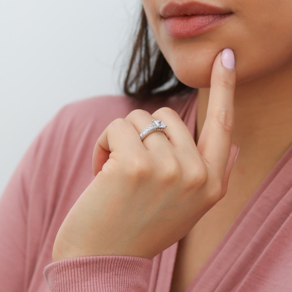 Model wearing Solitaire Milgrain 1.2ct Princess CZ Ring in Sterling Silver, 6 of 9
