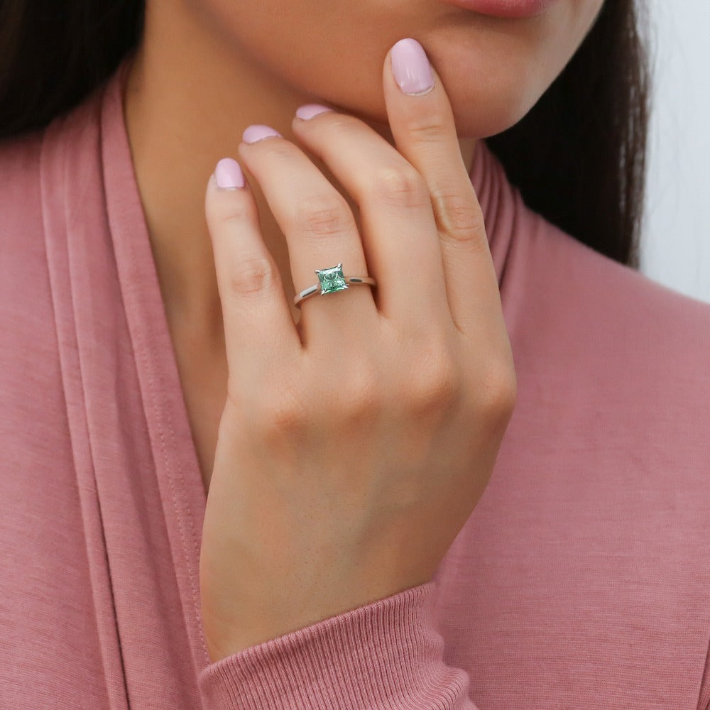 Model wearing Solitaire 1.2ct Green Princess CZ Ring Set in Sterling Silver, 2 of 13