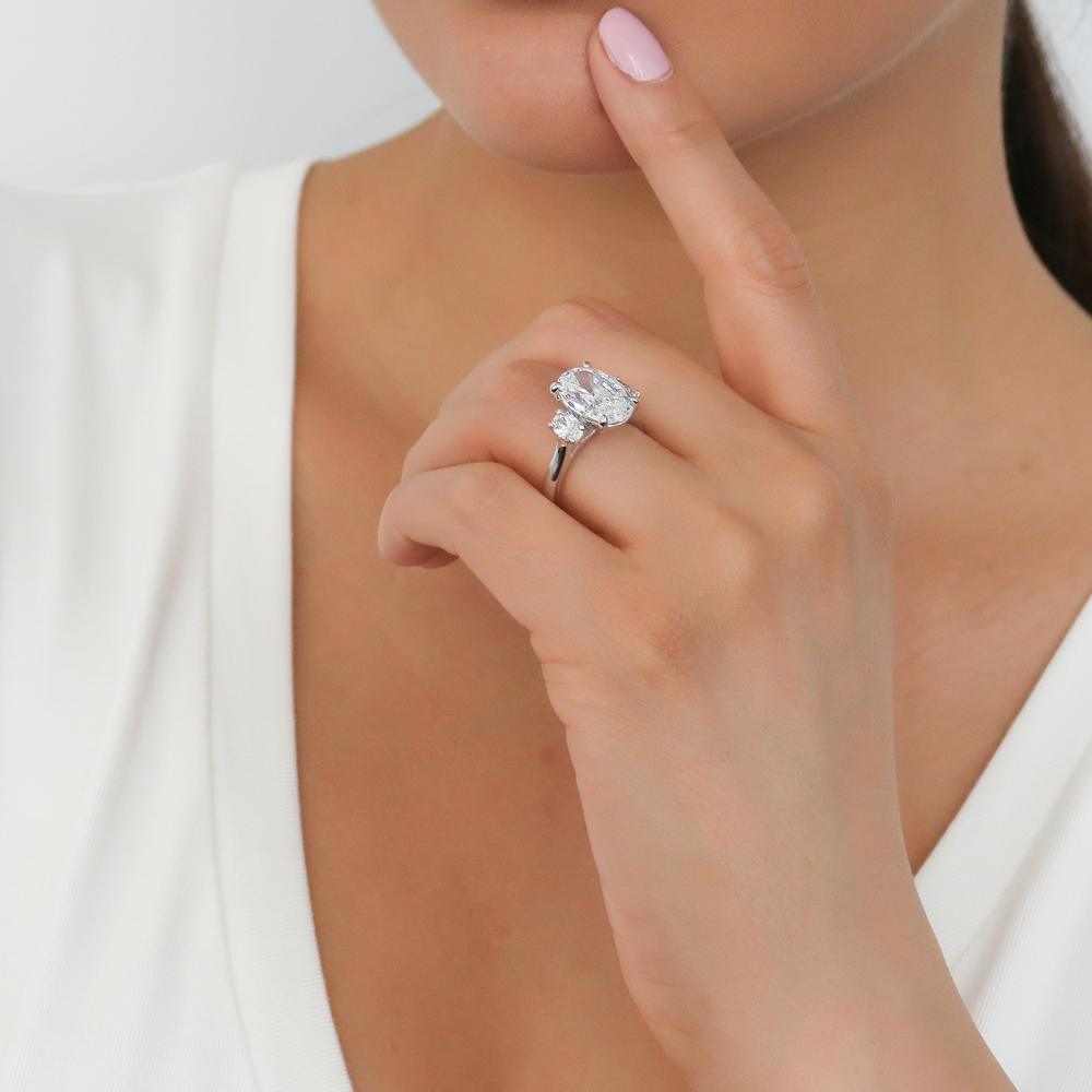 Model wearing 3-Stone Oval CZ Statement Ring in Sterling Silver, 11 of 14