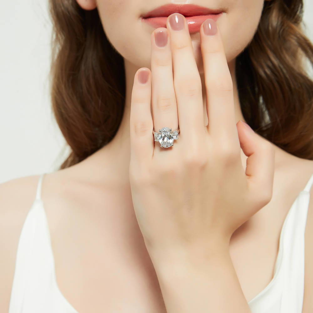 Model wearing 3-Stone Oval CZ Statement Ring in Sterling Silver, 2 of 14