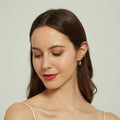 Model wearing CZ Leverback Earrings in Sterling Silver, Yellow Gold Flashed