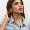 Model wearing CZ Large Inside-Out Hoop Earrings in Sterling Silver 2.2 inch, Rose Gold Flashed