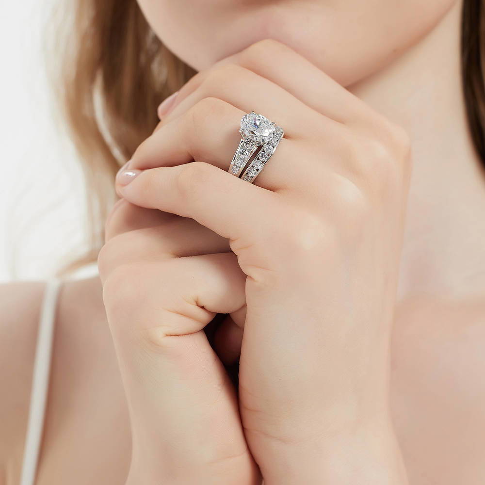 Model wearing Solitaire 2.5ct Oval CZ Ring Set in Sterling Silver, 6 of 17