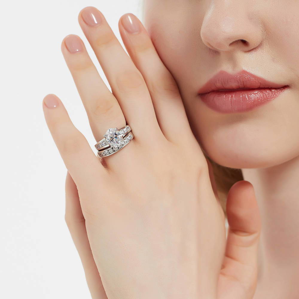 Model wearing Solitaire 2.5ct Oval CZ Ring Set in Sterling Silver, 3 of 17