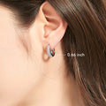 Model wearing Dome CZ Medium Hoop Earrings in Sterling Silver, 0.62 inch