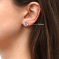 Model wearing Solitaire CZ Stud Earrings in Sterling Silver, 8mm