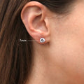 Model wearing Solitaire CZ Stud Earrings in Sterling Silver, 7mm