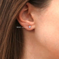 Model wearing Solitaire CZ Stud Earrings in Sterling Silver, 4mm