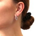 Model wearing Woven CZ Medium Hoop Earrings in Sterling Silver 0.8 inch, Yellow Gold Flashed