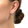 Model wearing Teardrop Fish Hook Earrings in Sterling Silver, Yellow Gold Flashed