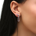 Model wearing Solitaire CZ Stud Earrings in Sterling Silver, 4mm