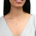 Model wearing Seashell CZ Pendant Necklace in Sterling Silver, Yellow Gold Flashed