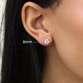 Model wearing Solitaire CZ Stud Earrings in Gold Flashed Sterling Silver, 5mm