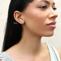 Model wearing Solitaire Bezel CZ Stud Earrings in Gold Flashed Sterling Silver, 7mm