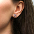 Model wearing Moon North Star Stud Earrings in Sterling Silver