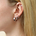 Model wearing Solitaire CZ Stud Earrings in Sterling Silver, 4mm