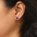 Model wearing Solitaire CZ Stud Earrings in Sterling Silver 1.6ct, Amethyst Color