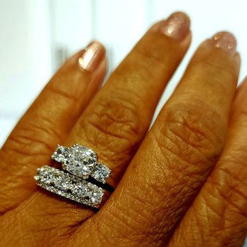 Model Wearing 3-Stone Ring, 5-Stone Half Eternity Ring