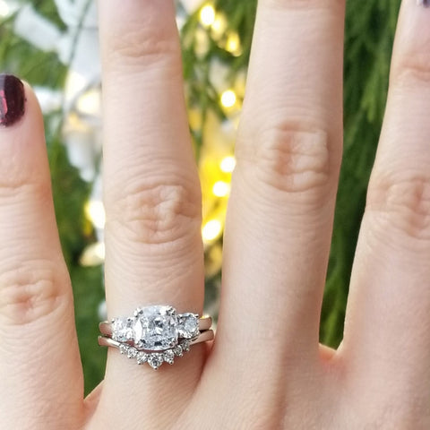 Image Contain: Model Wearing 3-Stone Ring, Wishbone Curved Band