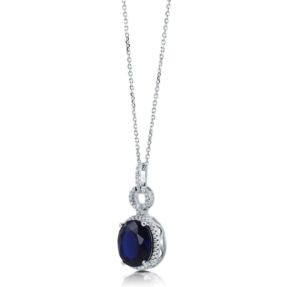Sterling Silver Halo Simulated Blue Sapphire Oval CZ Pendant